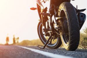 motorcycle driver following safety rules