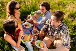 group of people enjoying meal