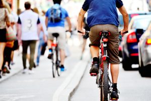 cyclist on a busy road