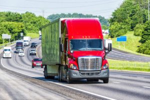 red semi truck on road