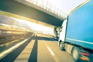 speeding semi truck on highway