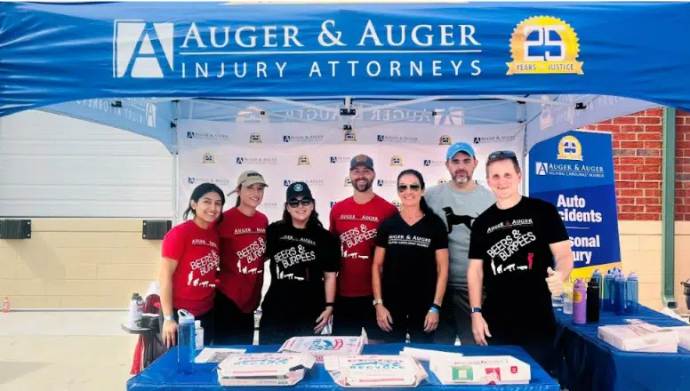 Auger and Auger Personal Injury Attorneys at charity event.